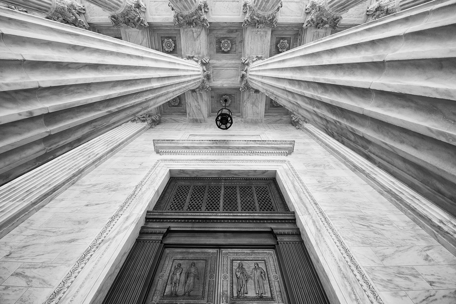 Photo of Courthouse columns looking upwards